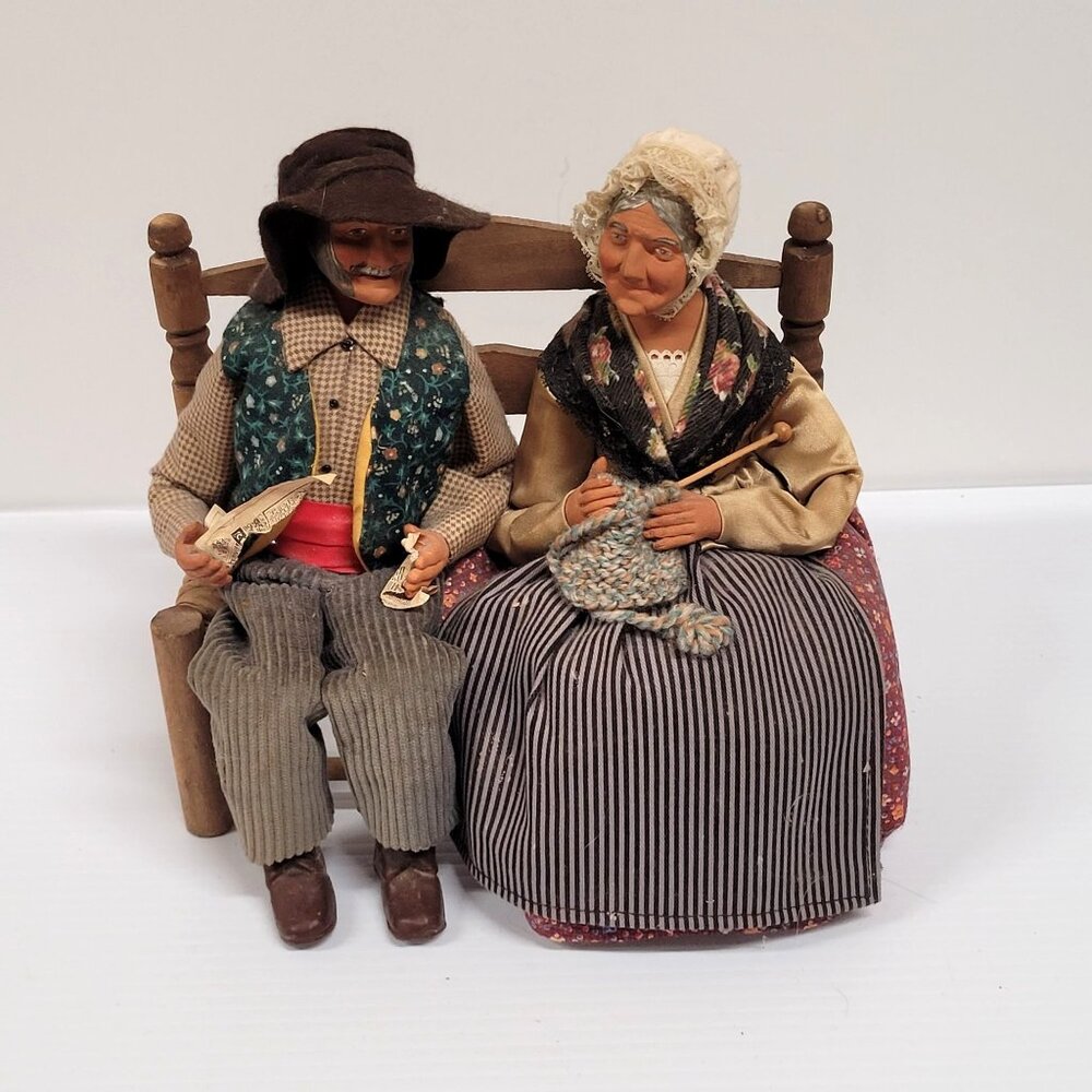 Santos Clay Man Woman Figurines Sitting on a Bench Made in France Knitting